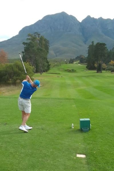 Erinvale Golf Course player swinging at the par 5